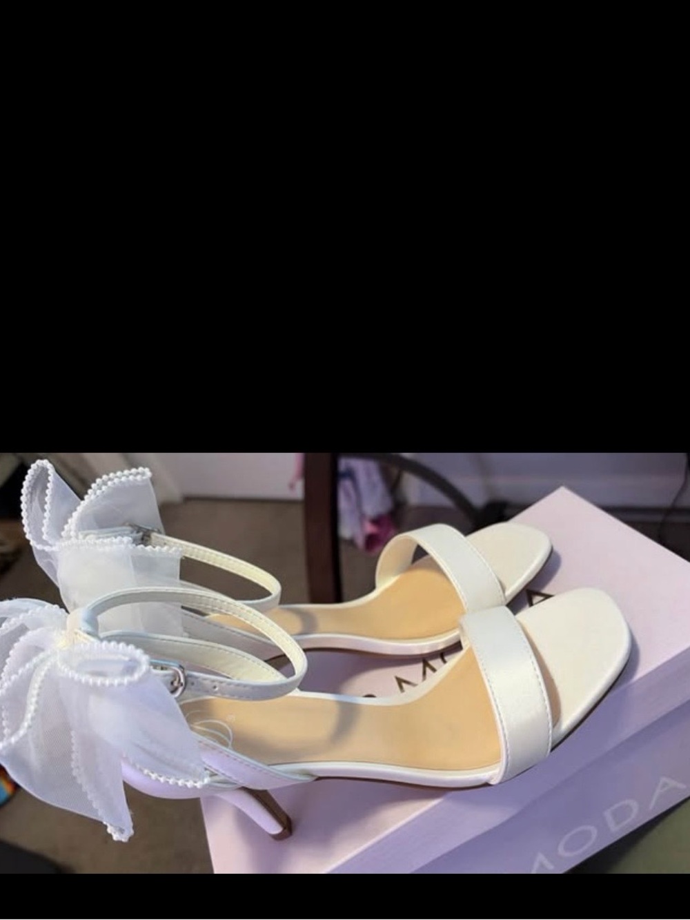 Elegant White Ankle-Strap Heels with Bow Detail